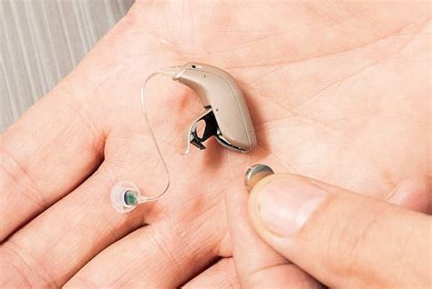 what is the metal that houses a hearing aid battery|does hearing aid battery work.